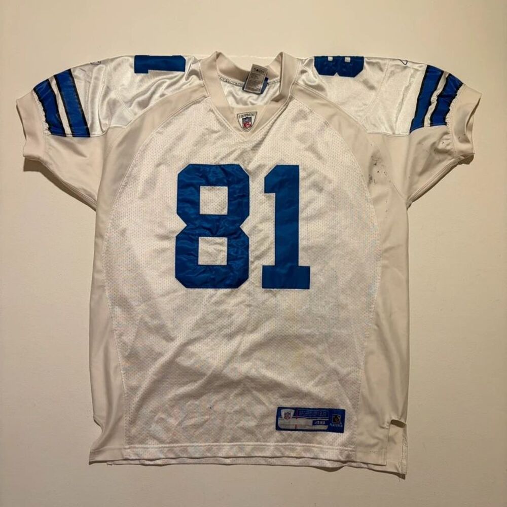 Stained Terrell Owen's Dallas Cowboys white and Blue Jersey